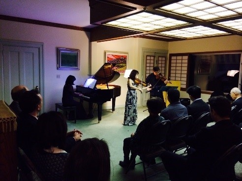 Musical performance by Pacific North Trio