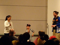 Visitors juggling kendama with Craig Langkaas