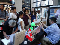 Joseph Wu demonstrates folding origami