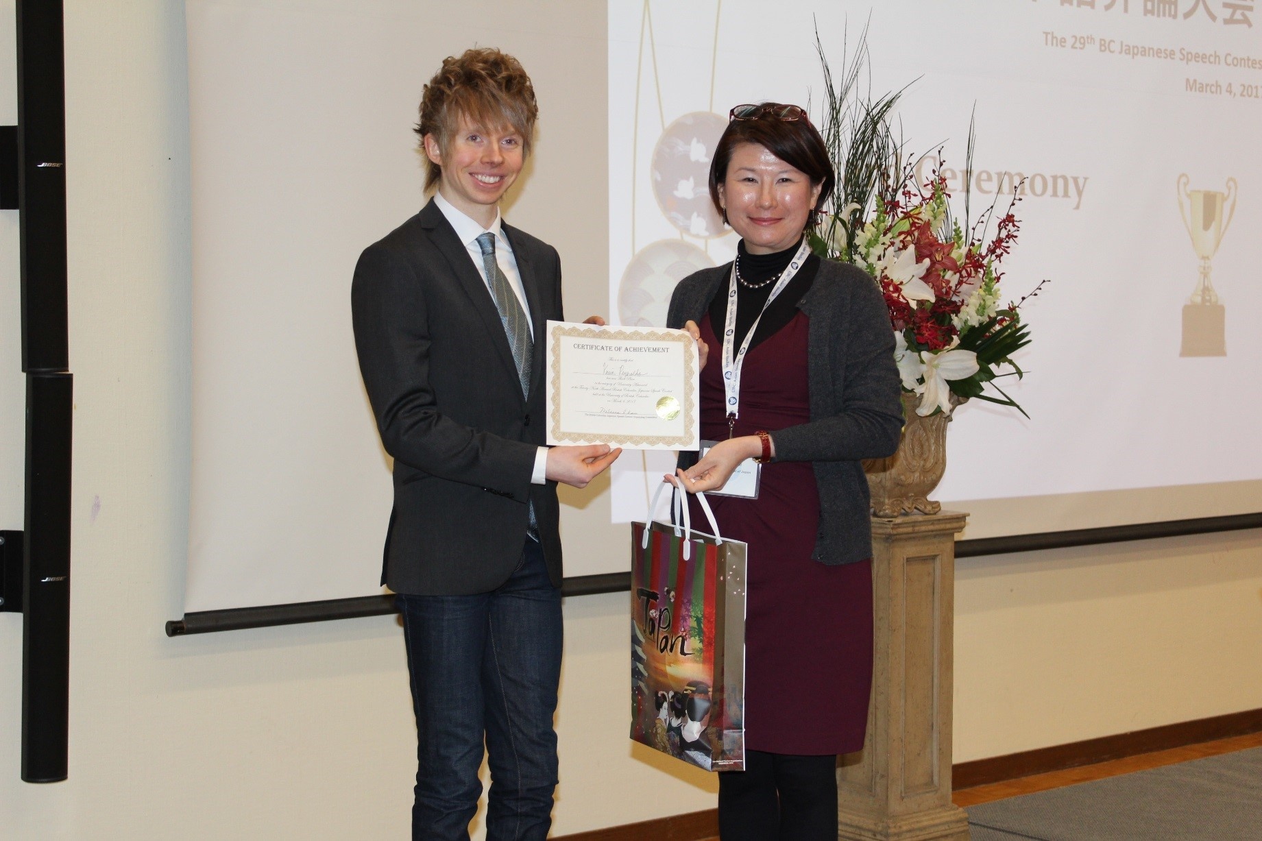 Consul General Okai presents award certificates